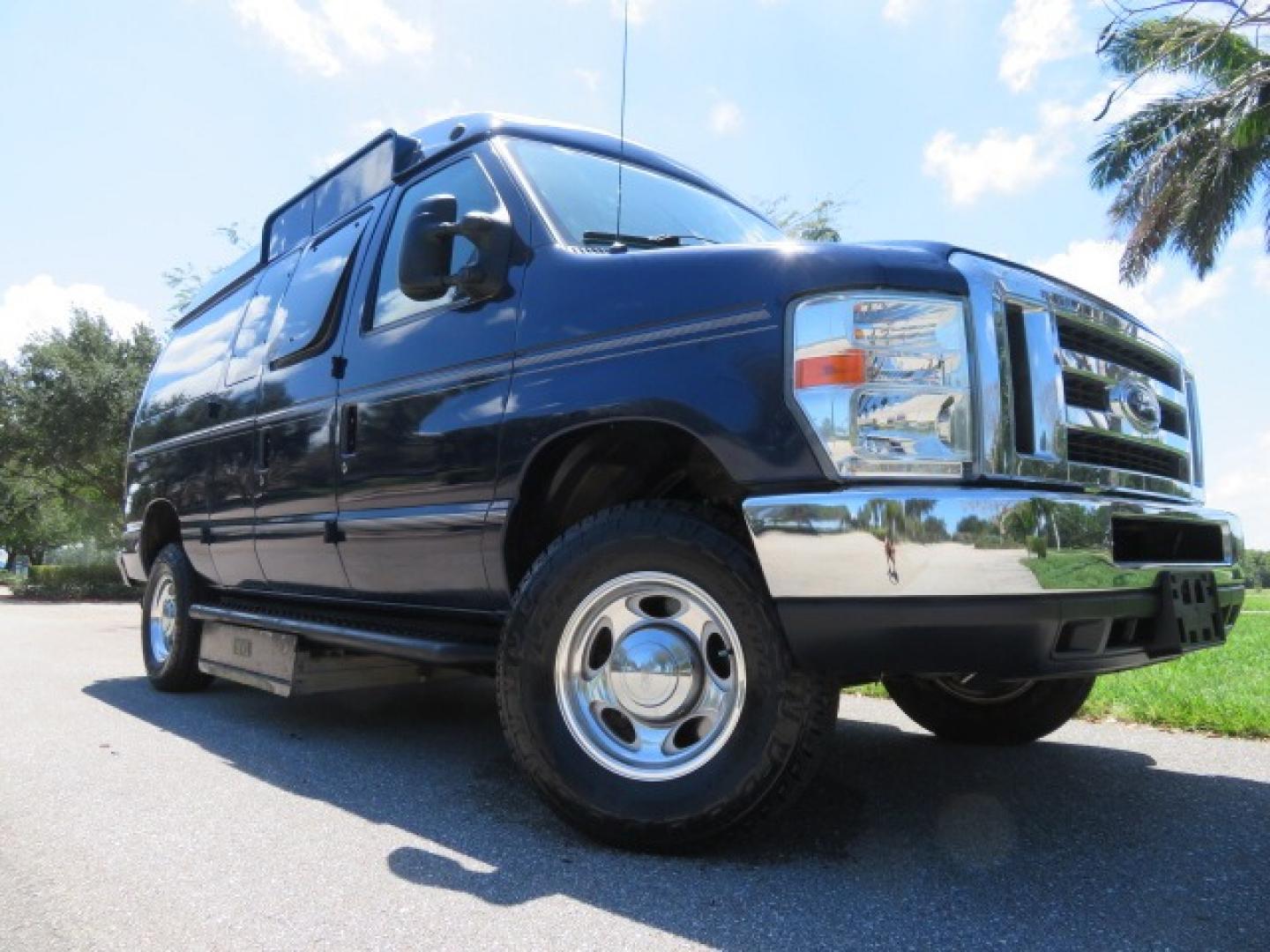 2011 Dark Blue /Gray Ford E-Series Wagon E-350 XLT Super Duty (1FBNE3BS4BD) with an 6.8L V10 SOHC 20V engine, located at 4301 Oak Circle #19, Boca Raton, FL, 33431, (954) 561-2499, 26.388861, -80.084038 - You are looking at a Gorgeous 2011 Ford Econoline E350 XLT Norcal Max High Top Handicap Wheelchair Conversion Van with 6.8L V10, 15K Original Miles, 9 Inch Lowered Floor, Braun UVL Side Entry Wheelchair Lift, Remote Control Power Side Entry Doors, Expanded Side Entry Doors, Q Straint Tie Down, Syste - Photo#3